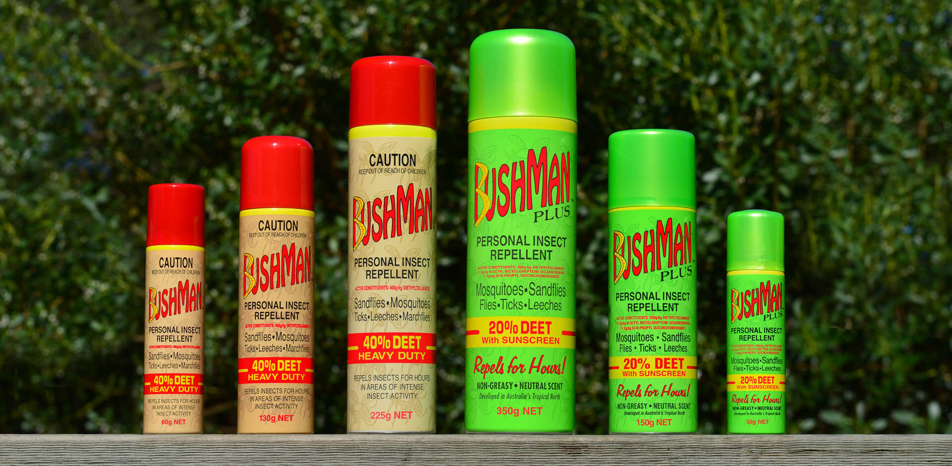Bushman Aerosol Cans on a bench